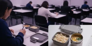 수능 시험장 책상 위, 따뜻한 보온 도시락과 함께 집중력 높은 표정으로 공부하는 수험생의 모습